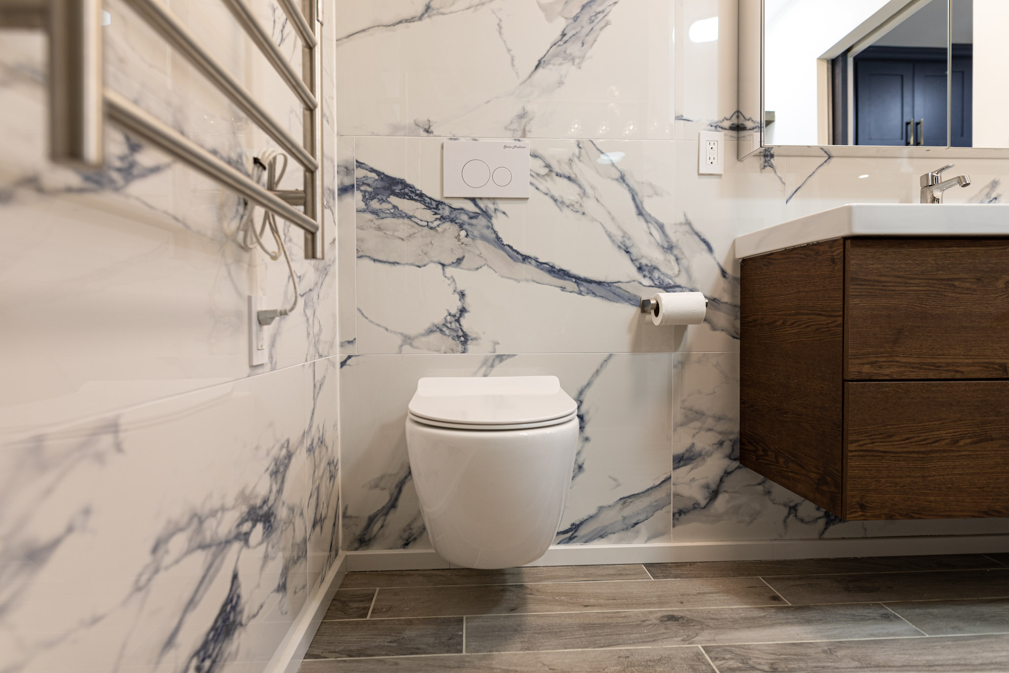 Modern bathroom with large format Italian porcelain tile