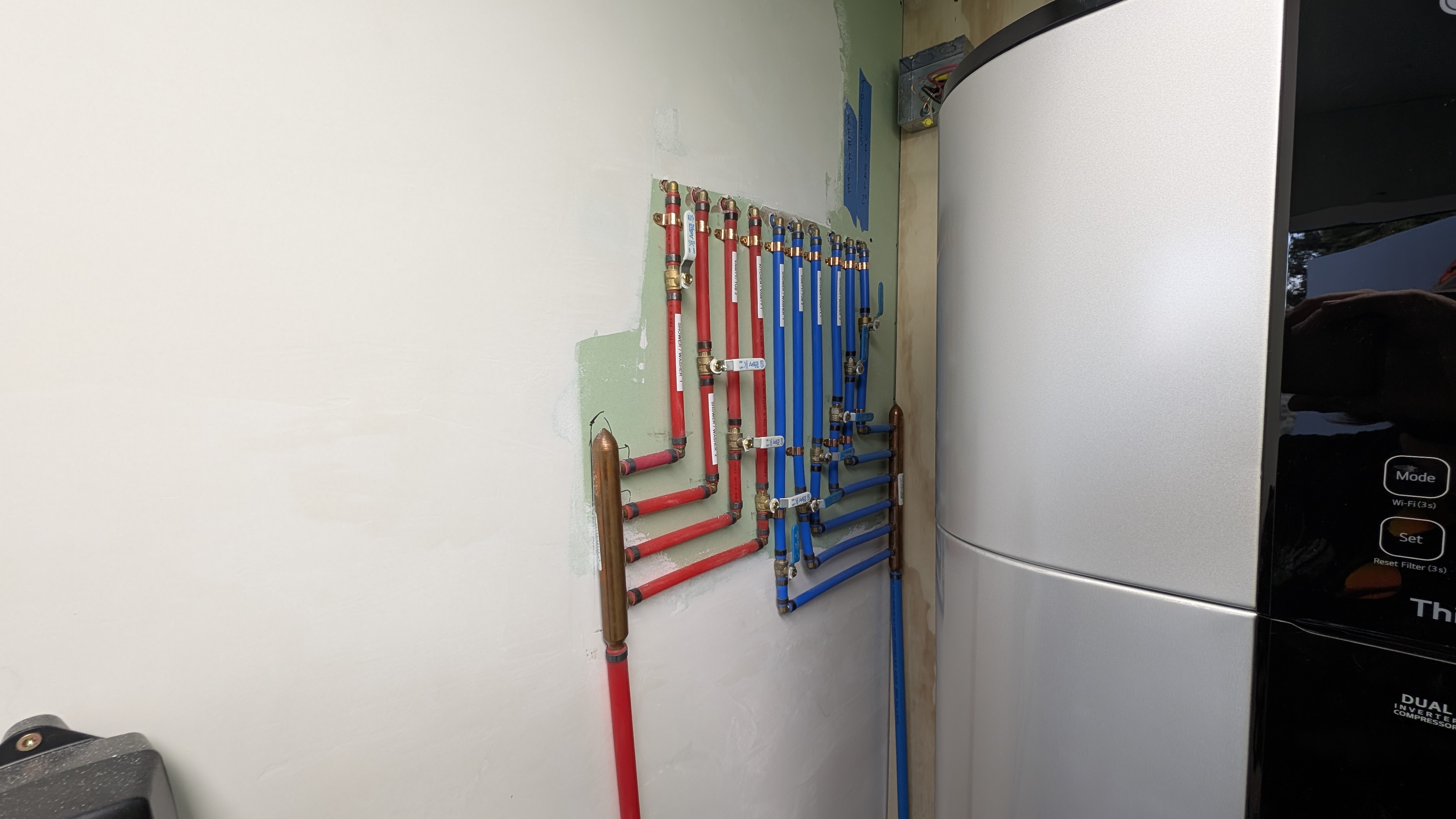 Custom whole house hot cold water plumbing manifold